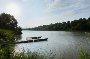 A landscape view of the Grand River with the boat launch.